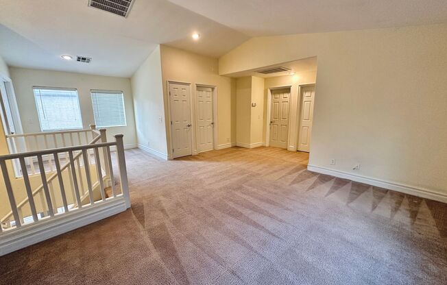 Rhodes Ranch guard gated golf course community home with a bedroom & full bath downstairs!