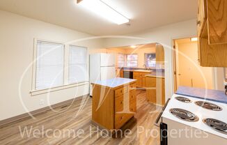 Cozy 3 Bedroom Home With Newer Flooring & Paint