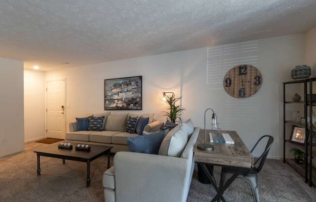 This is a photo of the living room  in the 1100 square foot 2 bedroom Kettering floor plan at Washington Park Apartments in Centerville, OH.