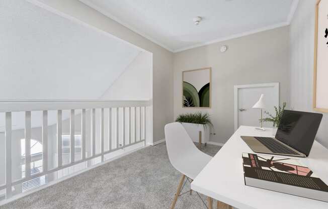a home office with a white desk and a laptop on a desk