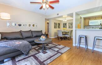 a living room filled with furniture and a fireplace