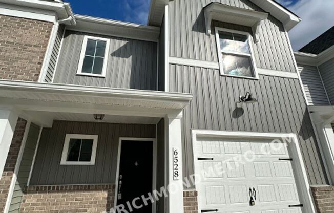 Charming Two-story Townhome, Boasting 3 Bedrooms, 2 Baths, 1 Half Bath