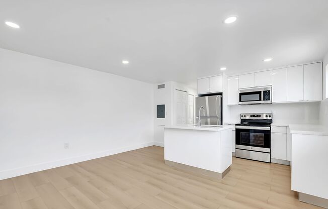 Brand New 2023 Renovated Building! 1 Bd/1 Ba, quartz countertops, washer/dryer, stainless steel appliances, 1 parking space.