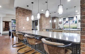 Resident Lounge with seating and kitchen