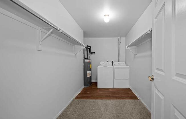 Ample storage space with in-unit washer/dryer at Woodland Villa Apartments in Westland, MI.