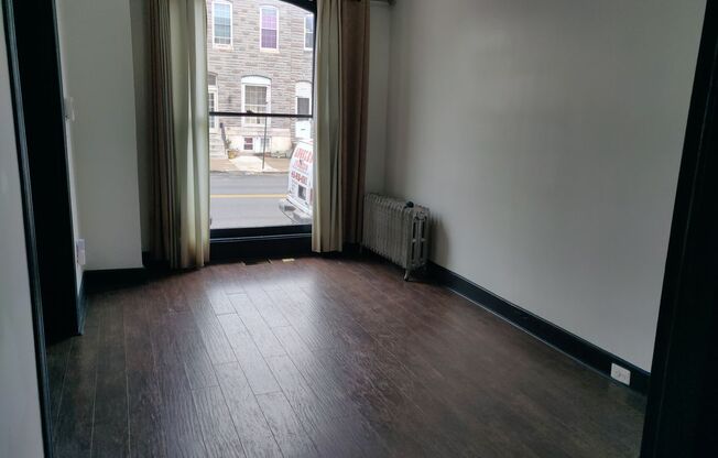 Spacious 2-Bedroom Townhome with Finished Basement and Parking Pad