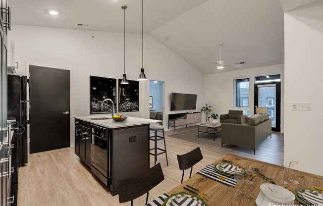 a view of the kitchen and living room from the dining area