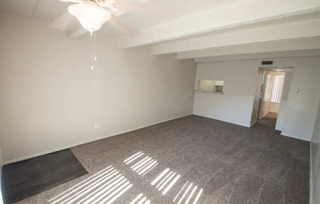 This is a photo of the living room in the 500 square foot 1 bedroom apartment at Harvard Square Apartments, in Dallas, TX.