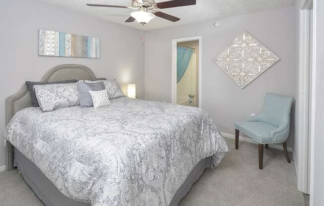 Bedroom with Plush Carpeting and Attached Bathroom