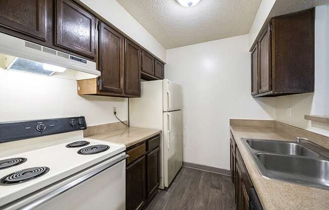 Apartment kitchen with dishwasher and cupboard space