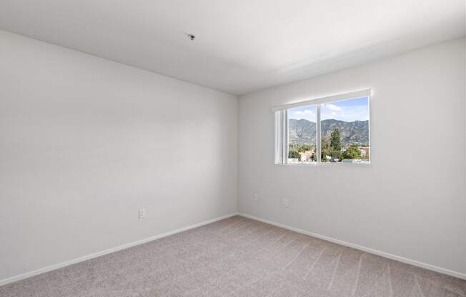 a room with white walls and a window at Dronfield Astoria, 13140 Dronfield Ave, California