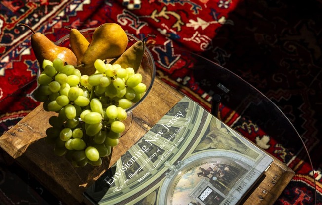 a bunch of grapes sitting on a table