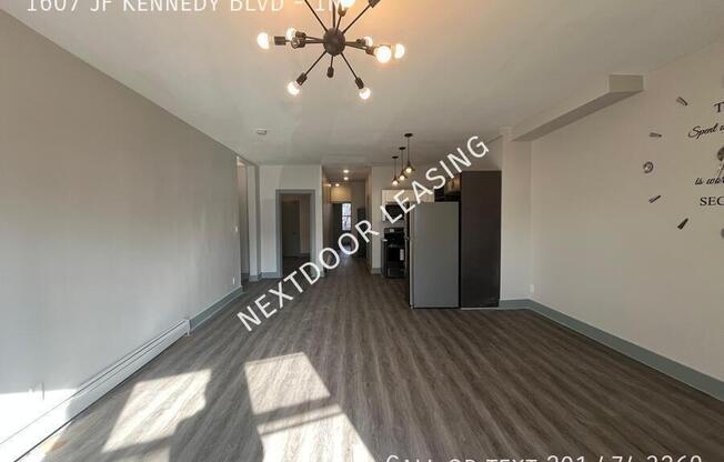 1607 JF KENNEDY BLVD