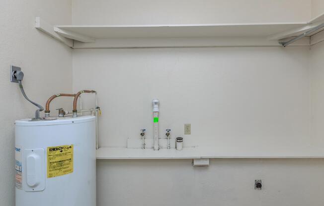 a white refrigerator freezer sitting next to a sink