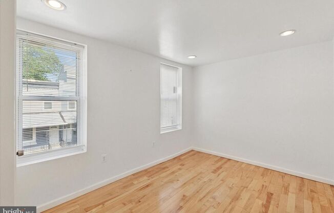 Updated 2BR Townhome with Dual Ensuite Baths, Hardwood Floors & Private Patio in Grays Ferry