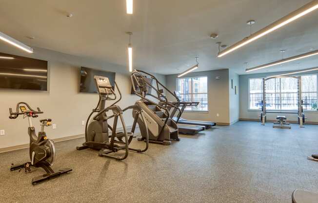 the gym at the wheaton apartments in wheaton at The Bella at Westchester, Midlothian, VA, 23113