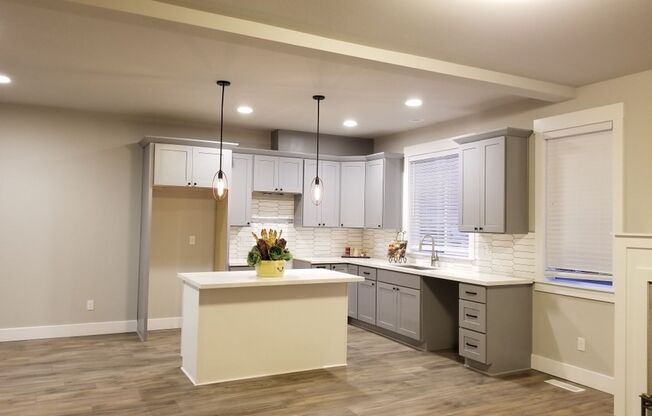 Fantastic Updated Corner Two-Level Unit in a Convenient Location!