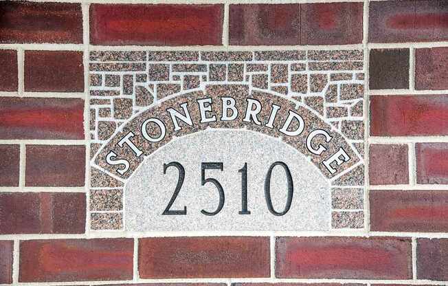 Stonebridge 2510 is etched into this brick wall. Fargo, ND Stonebridge Apartments