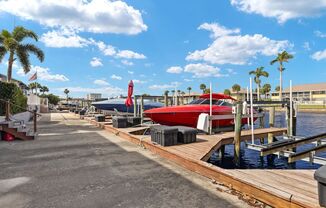 Furnished Gulf Access Canal View Boat Lift and Dock