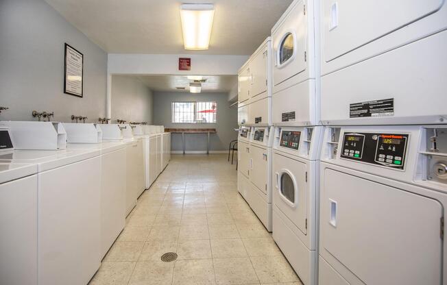 a kitchen with a sink and a refrigerator