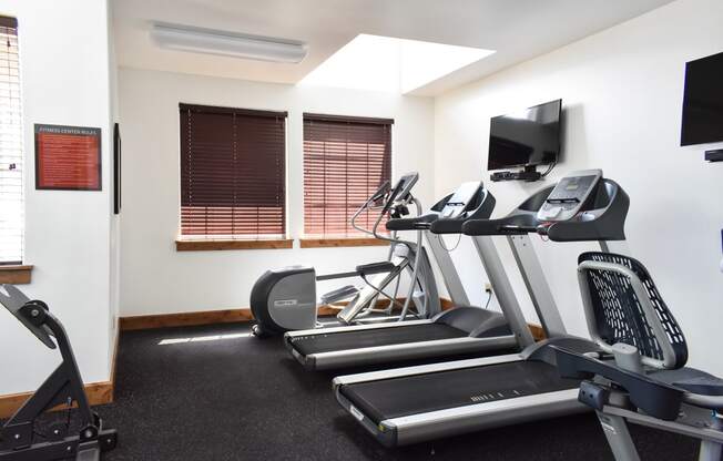 the gym has a lot of exercise equipment  at Quail Springs, West Richland, 99353