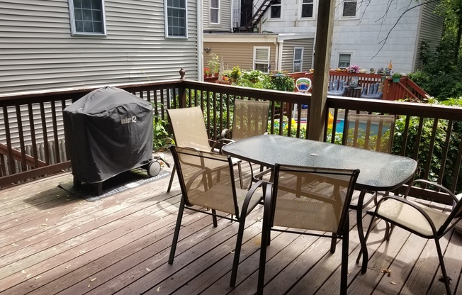 Bi Level Rehabbed 2 Bd 2 Bath With Laundry & Private Deck Condo in Southie Available 9/1