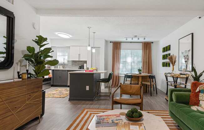 an open floor plan with a kitchen and living room