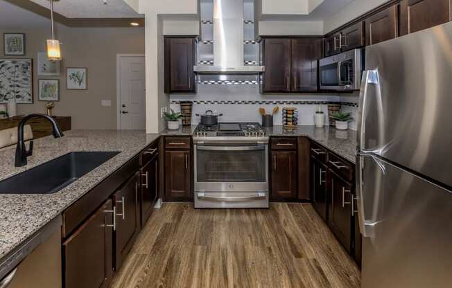 kitchen with appliances at Level 25 at Sunset by Picerne, Las Vegas