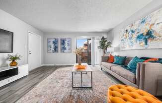 a living room with a couch and a tv