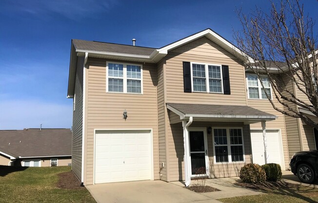 Updated End Unit Townhome with Garage