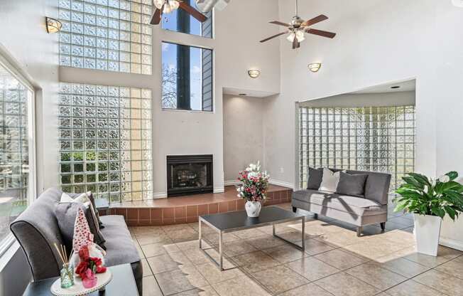 Living room with couches and a fireplace at Wellington Farms, Charlotte, NC, 28212