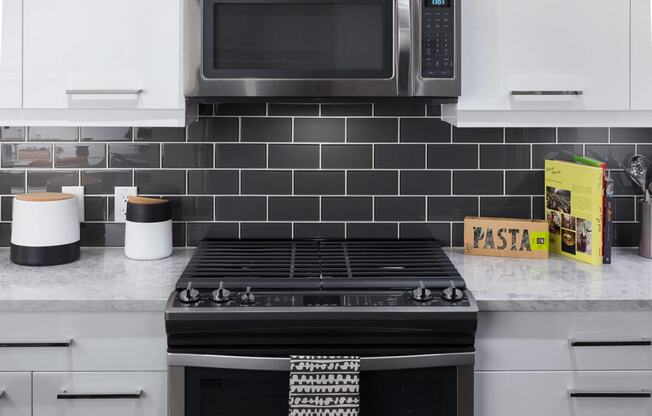 Gas Ranges in Kitchen at 1000 Speer by Windsor, Colorado, 80204