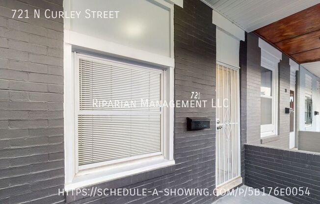 721 N CURLEY ST