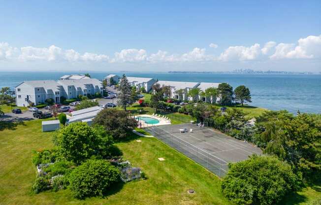 Bass point from the air with boston in background, amenities including swimming pool