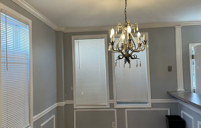 Spacious Home for Rent! Open Floor-Plan! Partially Finished Basement! Front Porch & Fenced in Yard! Available Now!