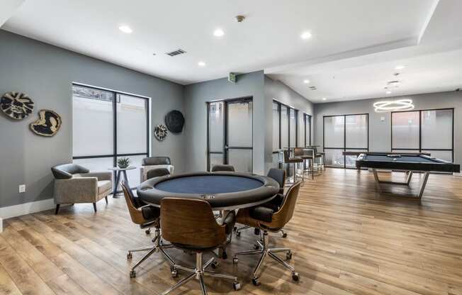 Resident clubhouse game lounge featuring game table