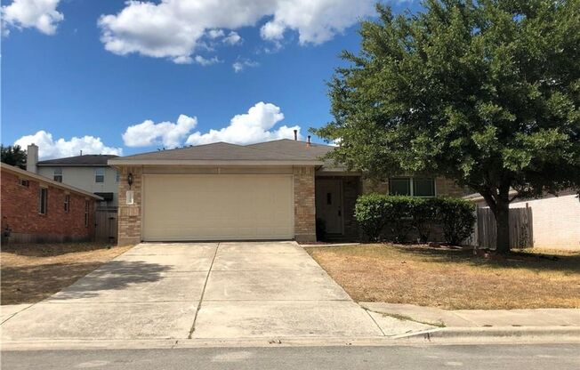 126 Salado Dr in Kyle is a charming single-story brick home nestled in the Silverado at Plum Creek community!