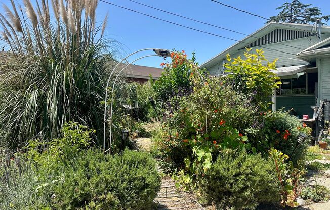 Reduced! Peaceful 2 Bed/1 Bath Craftsman Bungalow w/ Expansive Self Sustaining Garden