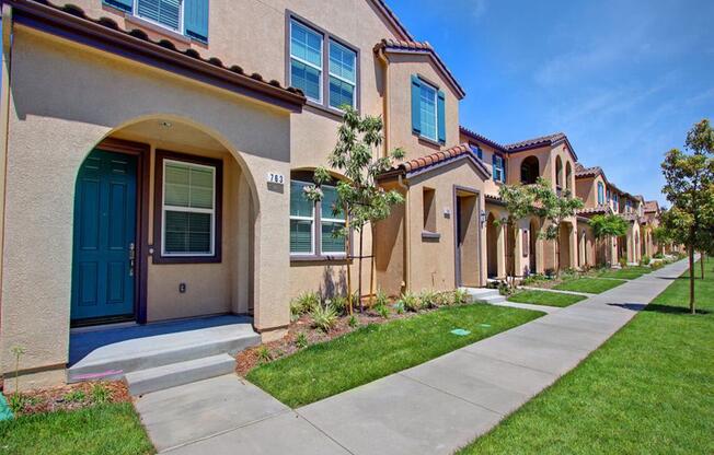 an image of an interesting building with a street in front of it at The Vines at Riverpark, LLC, Oxnard, 93036