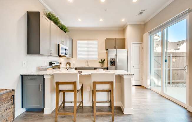 Gourmet Kitchen With Island at Avilla Oakridge, Forney, TX