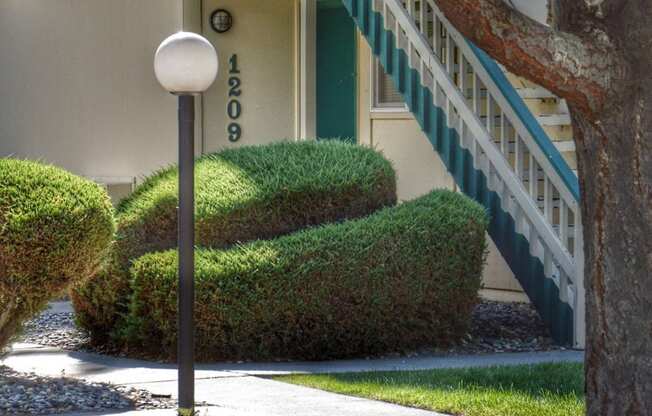 La Verde Apartments Outdoor Walkway and Bushes