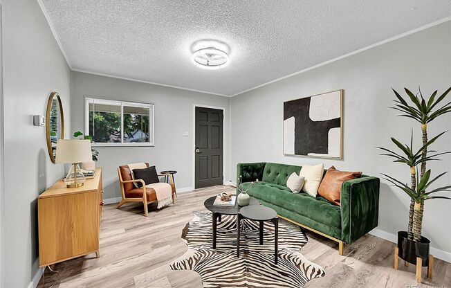 LOCATION LOCATION!!  LOHI Italian styled single family home.  Remodeled with LVT flooring, Granite counter tops & fenced-in-yard!