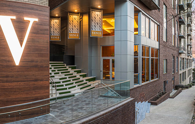 a view of the front of a building with a staircase