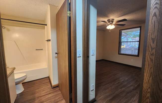 the master bedroom and bathroom from the living room