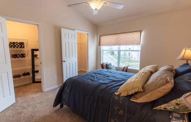 This is a photo of the primary bedroom in the 1242 square foot, 2 bedroom, 2 and 1/2 bath Spinnaker floor plan at Nantucket Apartments in Loveland, OH.