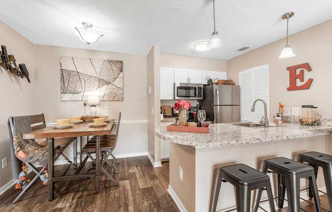 our redesigned kitchen and dining area is open to the living room and family room