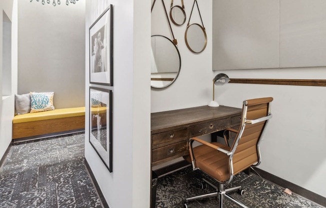 a study area with a desk and a chair and a mirror at Bakery Living, Pittsburgh, PA