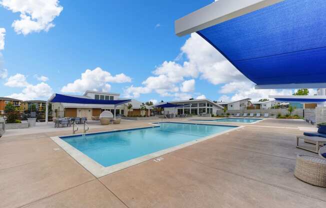 Pool with Lounge Chairs, Blue Skies with Clouds, 