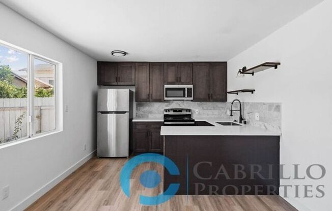 207 E 1 ST