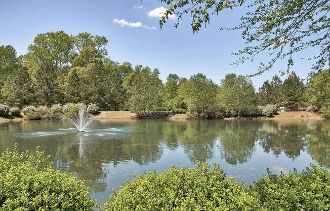 a fountain in the middle of a lake